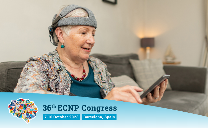 Image of participant using the Cumulus headset alongside an ECNP 2023 logo